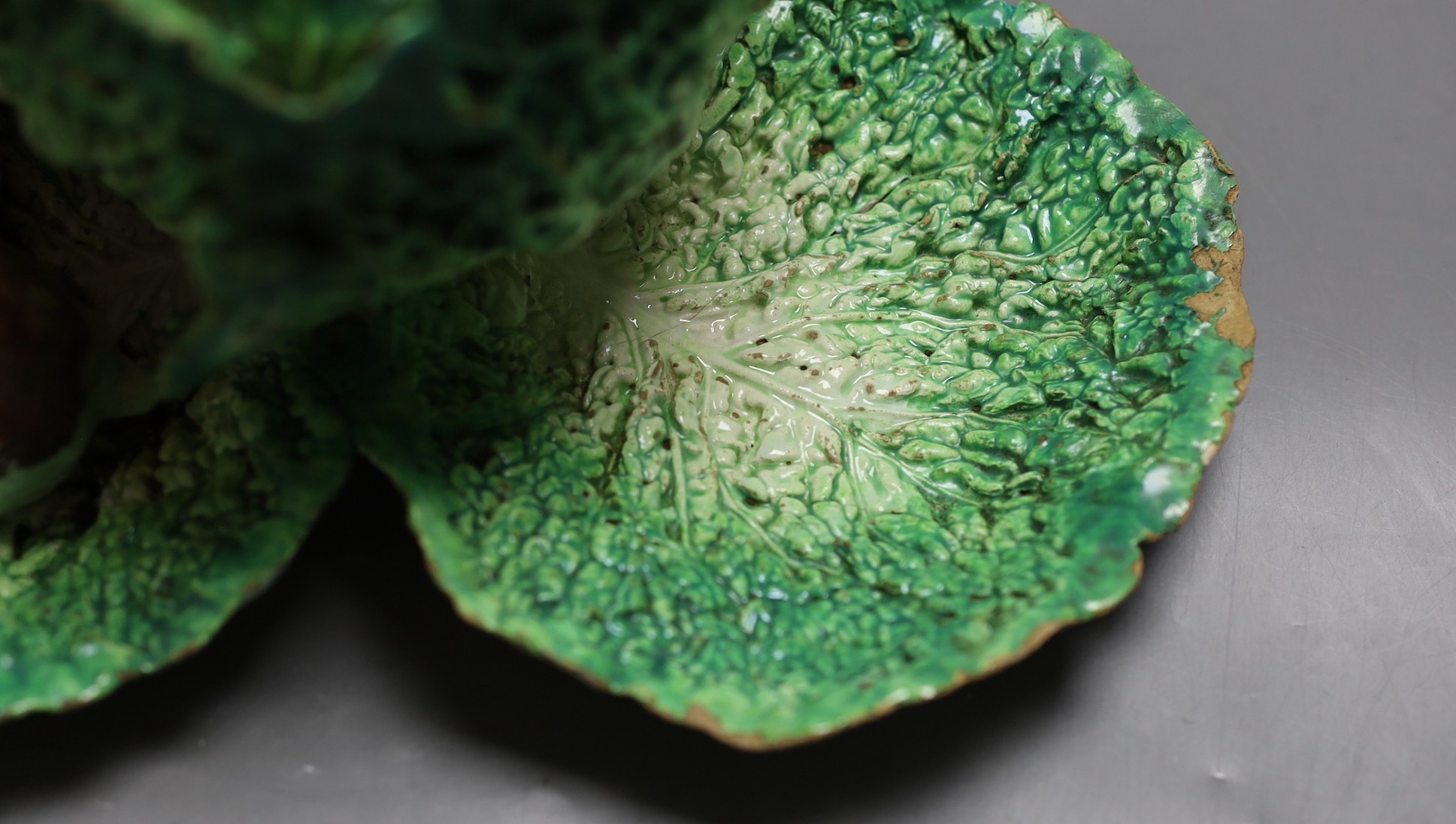 An unusual French earthenware rabbit and cabbage centrepiece. 16.5cm tall